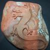 Carved river rock - single skink design